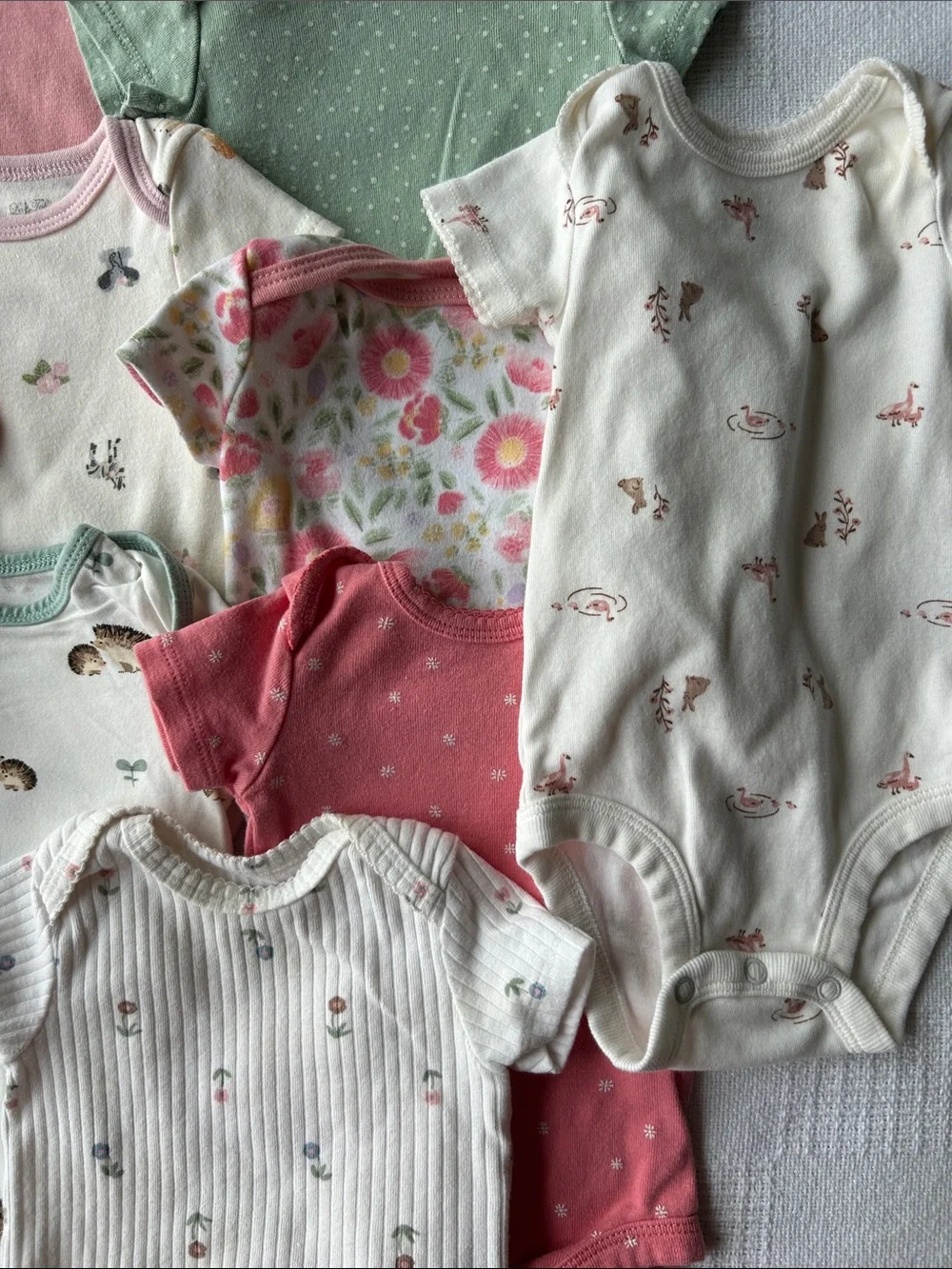 9 Girls Onesies size 0-3 months
